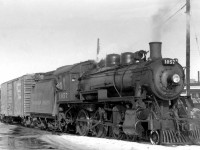 Well-known Canadian Pacific D10g 4-6-0 1057 is pictured working in regular freight service at Owen Sound in 1957, during its career as just another one of CP's numerous D10's. The D10-class of steam engines were popular "do-everything" locomotives often used in branchline, local, mainline, and passenger duties all across the CP system, like an SW1200RS or GP9 would be in the diesel era.
<br><br>
1057 would go on to operate on the famed <a href=http://www.railpictures.ca/?attachment_id=16279><b>"tripleheader" excursion</b></a> on May 1st 1960, and work in fantrip and excursion service for the next few decades before going to its present home in Tottenham.<br><br>
Working a fantrip at Campbellville with 136: <a 
href=http://www.railpictures.ca/?attachment_id=14939><b>http://www.railpictures.ca/?attachment_id=14939</b></a>
