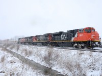 Train 148 heads east out of Sarnia with over 11,000 feet of mostly double stacked cars. CN 8017 leads with help from CN 2118, CN 8931 and CN 8924.