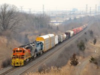 <b>Lucky catch.</b> GEXR 3393, GEXR 3054, GSCX 7369 are the power on GEXR 431 which is climbing 'knuckle alley' on CN's Halton sub. I was about to leave here after a few minutes as it started raining but heard a westbound on the scanner and was surprised to see a Goderich-Exeter train.