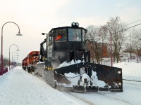 Spreader CP 402893 and pair of CP SD40-2's (CP 5788 & CP 5926) are stopped near Montreal West station after clearing the Westmount sub. This was a week after after a record-breaking storm dumped about 45 cm of snow on the island of Montreal. 