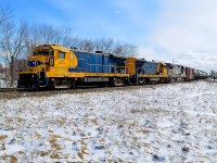 <b>The MMA leaving Farnham.</b> An MMA local for St-Jean has two B23-7's and a B39-8E (MMA 2004, MMA 2001 & MMA 8546) as it leaves Farnham in March 2013, a few months before the Lac-Mégantic disaster made the MMA an infamous name.