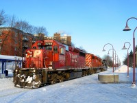 <b>Two SD40-2's and a spreader.</b> A pair of CP SD40-2's (CP 5788 & CP 5926) along with spreader CP 402893 are stopped in front of Montreal West station after clearing the Westmount sub. This was a week after after a record-breaking storm dumped about 45 cm of snow on the island of Montreal.