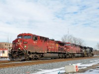<b>CP & NS power, light on CN.</b> CN 529 has no cars as it heads west through St-Henri, with CP 9611, CP 9709 & NS 9941 for power.