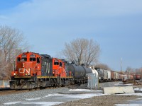 <b>A pair of GP9's elephant style.</b> GP9's CN 7062 & CN 7204 are arranged elephant style as they lead transfer CN 500 towards Taschereau Yard with 35 cars.