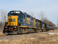 The daily CSX train with a three unit lash up, CSX 2757, 2799 and 2561 cross Tashmoo Ave on their way back home.