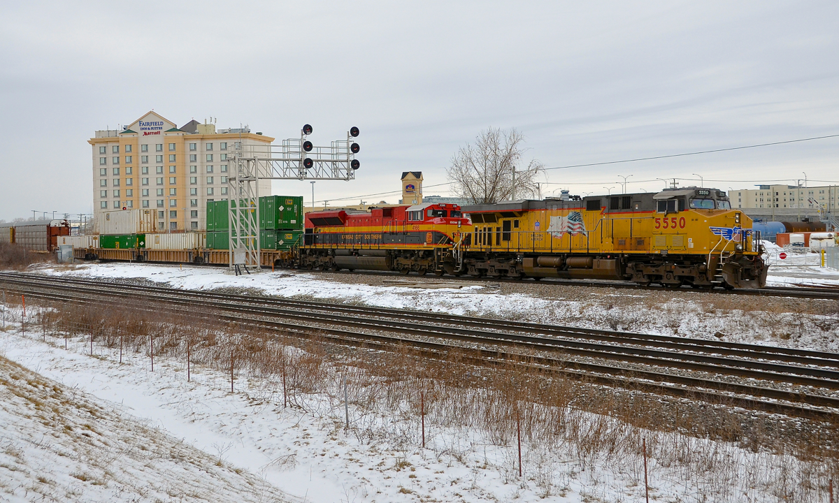 Two years to the day after shooting my first KCS unit (KCS 4012 on CP 119 at Dorval) I was lucky to shoot another one trailing on CP 142 at nearly the same spot. UP 5550 and KCS 4166 provide some colour on a dull afternoon as they lead CP 142 towards St-Luc Yard.