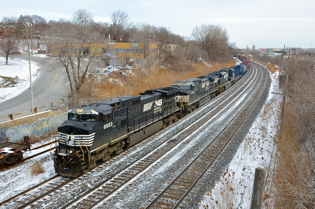 A pair of whiteface's up front. A pair of whiteface NS Dash9's (NS 8935 & NS 8998) along with SD70ACe NS 1160 lead CN 529 through Montreal West. Normally the domain of NS power, a lot of CP power has appeared on this train recently, but it was back to an all-black lashup today.