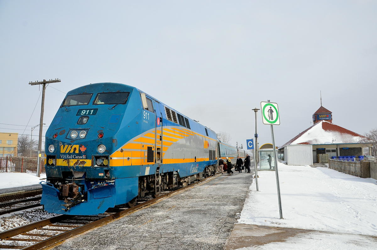 A beat up P42 nose. VIA 911 has one of the most beat up noses of any of the P42DC's on VIA Rail's roster. Here it leads VIA 55, boarding passengers at Dorval Station during a brief period of sunlight on a brutally cold and windy day.