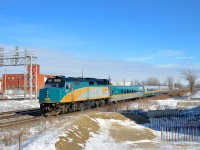 <b>Passing some unfinished construction.</b> VIA 55 is approaching Dorval station, passing part of an overpass which has been unfinished for quite a number of years due to the provincial government failing to get permission to build over the CN and CP main lines. I believe the issue has been settled and construction will begin in the spring.