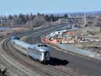 
A compete train.
<br>
<br>
Very nice touch.
<br>
<br>
Can anyone think of a better way to finish an inter-city train?
<br>
<br>
VIA Train #61 offered three levels of accommodation today:
<br>
<br>
Coach Class
<br>
<br>
Business Class
<br>
<br>
Prestige Class
<br>
<br>
One of four Park cars rebuilt 2011-2012 by Avalon Rail, Milwaukee:  8706 Glacier Park;  8708 Kootenay Park;  8709 Laurentide Park;  8710 Prince Albert Park. So, anyone know the identity of this Park?
<br>
<br>
2001 GE built  P42DC  #911 is train #61 power. 
<br>
<br>
On a dry, warm, snowless ….after all this is the 'banana belt'....February 22, 2016 at Hopkins Street, image by S.Danko
<br>
<br>
…I do miss the CP RAIL action red:
<br>
<br>
<a href="http://www.railpictures.ca/?attachment_id=8558"> at an ex GTR station </a> 
 <br>
<br>
sdfourty
<br>
<br>
p.s. The new GO rail service centre takes shape on the north (right ) side.
<br>
<br>
[…hey hey, no doubt the Park car was dead-heading, but it would be nice if.....]
<br>
<br>
So, anyone know the identity of this Park?
