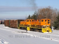 A pair of SW1500's with Penn Central and later Conrail heritages now work together sorting forest and steel products in Sault Ste. Marie, Ontario. QGRY 1501 (PC/CR 9508) HCRY 1505 (PC/CR 9538).