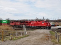 (Another) pair of GE's power an eastbound CP at Lovekin, Ontario. 
 <br>
<br>
Even as recently as 2012 the Stephenson / Lakeshore Road crossing had a rural look ! (today the road is paved).
 <br>
<br>
Image by S.Danko
 <br>
<br>
Same location, twenty-eight years earlier: 
 <br>
<br>
<a href="http://www.railpictures.ca/?attachment_id=15339">  MLW heavies </a> 
 <br>
<br>
sdfourty

