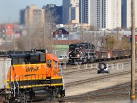 Where's are we? If it wasn't for that skyline you might think it was some random yard, in the states. However we are just off the CN Rivers Sub in Fort Rouge yard as the daily transfer from the BNSF enters the yard. On the main is a Central Manitoba Railway work train patiently waiting their turn to head for their Carman Sub operation. Just moments prior VIA #1 raced past on the north main.