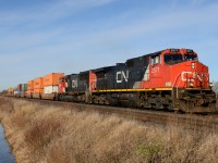 Another Spring like day in Southern Ontario as CN 2571 leads train 382 out of Sarnia at Waterworks Sideroad.