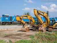 Back in August of 2013, RLHH 595 sits at Garnet Ontario with a trio of GP20D's in the Southern Ontario Railways yard there.  This was a beginning of a transition era at Garnet, Genesee and Wyoming had recently purchased Rail America and all of its subsidies making the SOR a G&W line.  Traffic levels on the Hagersville Sub were surging and Garnet was unable to handle the increase in car loads coming into and out of ESSO.  The large equipment in the foreground of the image was there to aid in the construction of the new yard track at Garnet which would be completed before the winter.  I also blame Steve Host for this shot...he posted the photo of CEFX 2006 yesterday and got me thinking back to shots I had of the GP20D's on the SOR.  Apparently nobody but me liked them!