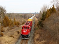 CP 5023 (SD30C-ECO) leads CP 9731 up to the Highway 6 overpass and MM45 on the Galt sub with running lights off as they prepare to stop on the Puslinch Main and meet two eastbound CP units approaching to head down the siding.