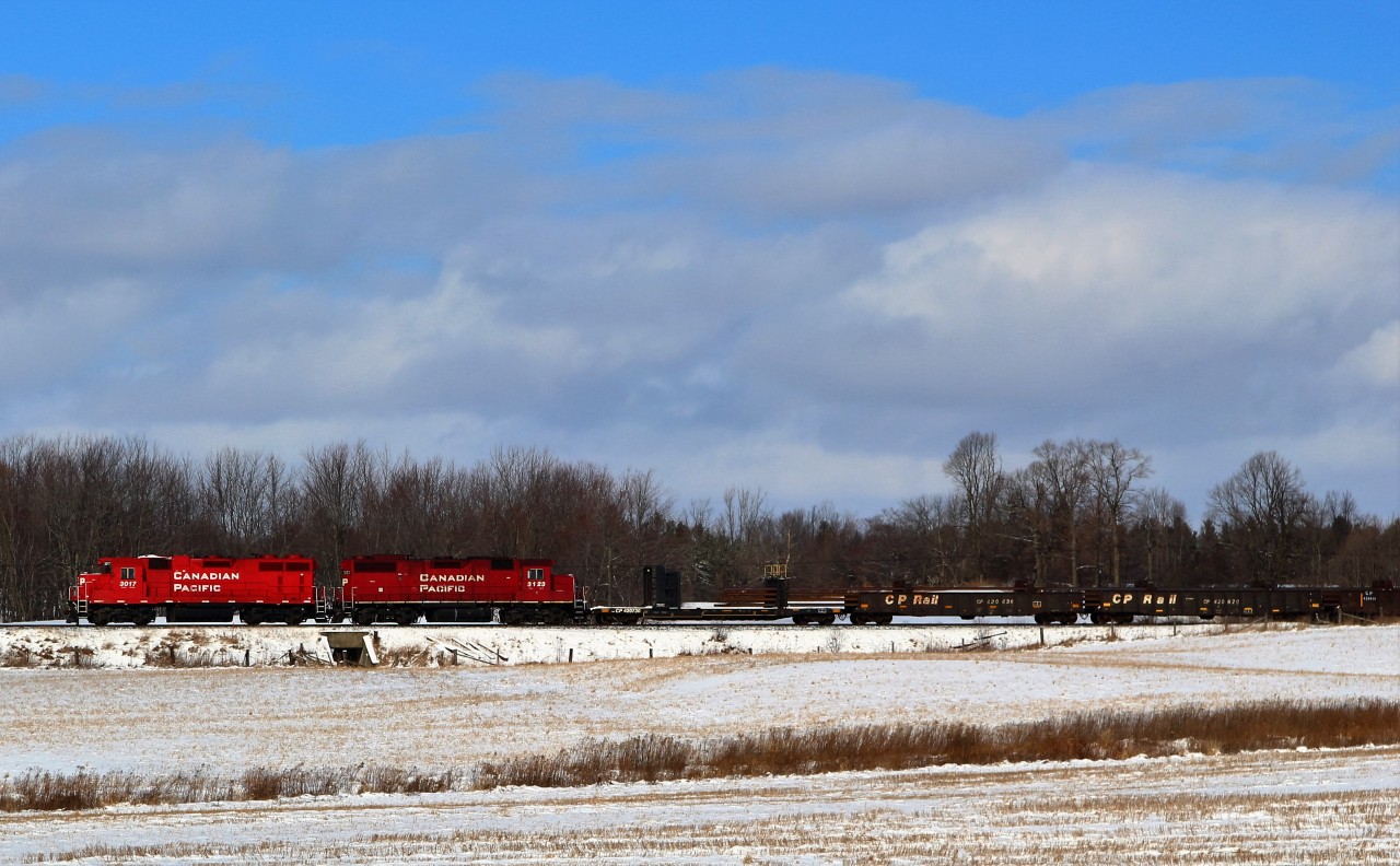 After sitting in Guelph Junction for the night, CP 3017 with CP 3123 lead the track train up the Galt sub along Gore Rd in Puslinch.