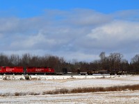 After sitting in Guelph Junction for the night, CP 3017 with CP 3123 lead the track train up the Galt sub along Gore Rd in Puslinch. 