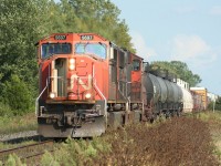 CN 5697 roars through the countryside approaching the Sarnia city limits with a westbound freight on a beautiful late summer day.

I think this was probably train no. 331.