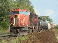 CN 5697 roars through the countryside approaching the Sarnia city limits with a westbound freight on a beautiful late summer day.

I think this was probably train no. 331.