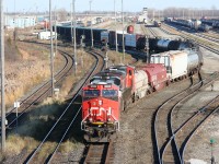 CN 501 pulls out of Sarnia Yard with a pair of GE ES44DC locomotives on the point.