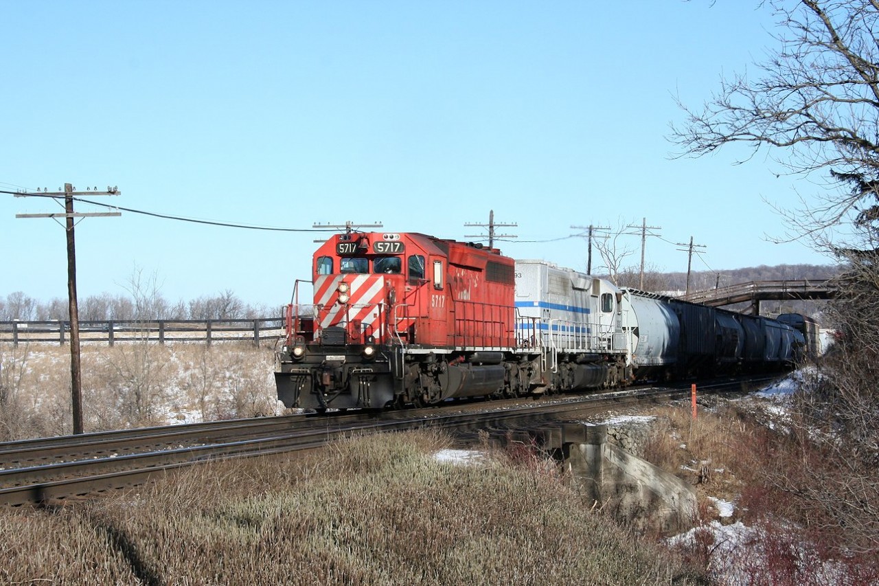 Faded CP SD40-2 5717 leads a rare SD40P on a westbound through Campbellville.