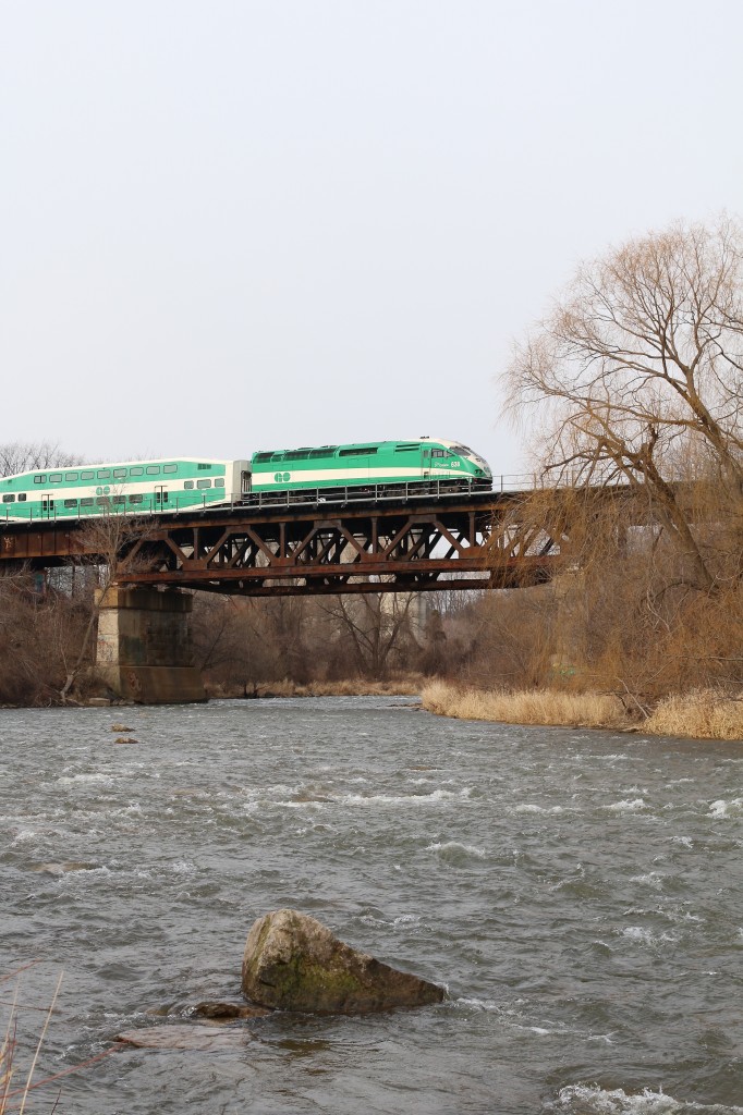 I'm not sure if this is a daily occurrence, but this mid day GO train is seen traveling westbound as it crosses the Credit River in Streetsville. CP T14 was forced to hold the south at Erindale until this train passed.