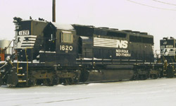 Originally painted in Norfolk & Western plain black this SD40 built in 1971 has a high short and dual control stands (one for driving long hood forward and one for short hood forward operation) This locomotive is now NS #38 rebuilt as a track test unit.