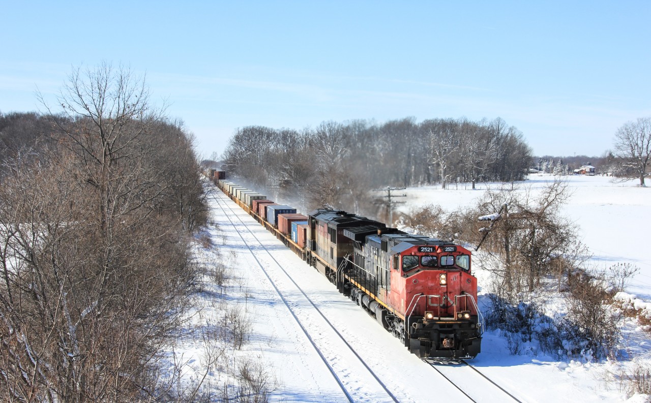 A sweet lashup (one of the best on CN in a while) leads CN Q148 under Frank Lane, just west of London.