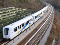 SkyTrain 208 (Bombardier ART Mark II 208), Millennium Line in the Grandview Trench at Nanaimo Street Overpass eastbound.