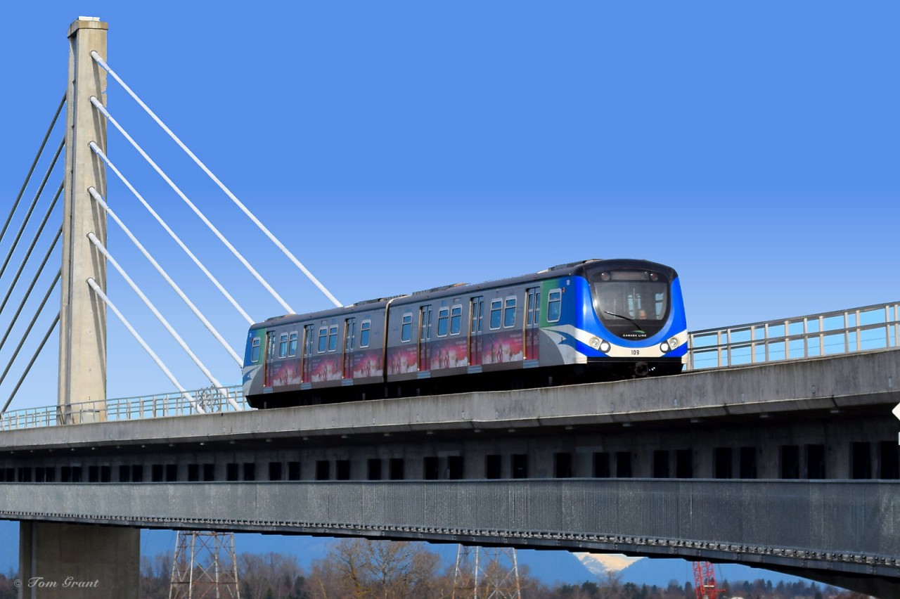 Canada Line Hyundai-Rotem cars on the North Arm Bridge (North Arm Fraser River) heading to Richmond from Vancouver.  This is an extradosed transit/pedestrian bridge.