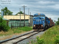 <b>Filling a few holes in my map</b> I realized I have nothing on the Talbot sub, despite a few chases in 2004/5. Here's a neat story which is a bit of dumb luck and well, just the way things were 10 years ago - be warned: a few of you younger folks are probably going to shed a tear:<br><br>After a night of debauchery in Downtown London with friends, I managed to get out by 10 AM to see what CN had in store - given the timeframe that I got out of bed I must have had a reasonable amount to drink that night. In the next 2 hours I managed to catch six moving freights - which back then just seemed normal.  Then the NI dispatcher lit up the radio and I heard the following:<br><br><i>"Clearance one ohh two, to NS 8349 south, proceed from Walton to Mile 12.7"</i> - NS 327 has arrived. Not being much of a locomotive guru at this point, I didn't know what the heck that was. I set up a few crossings down the Talbot sub and managed to shoot the scene you see here. A pair of ex Conrail - neat. You'd think I'd follow this the rest of the way to St Thomas.. wouldn't you.. but no, I did not. Something else happened that peaked my interest even more. (see next photo)<br><br>Photo notes: D70, 50mm f/1.8, time is 1251.