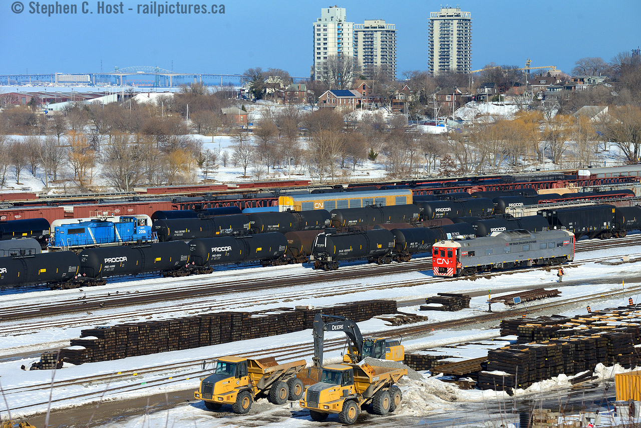 CN/SOR's Hamilton yard is a bit of a buzz of activity, CN 1501 is parking in the yard for the night, while CEFX 2006, now off-lease and elsewhere in this continent (CMQ?) is working the yard. Joe Bishop will like this I think, but those CEFX GP20D's weren't all that pretty :) I should note this shot is growing in ... fast... it won't be too long before these shots are difficult to get owing to growing trees.