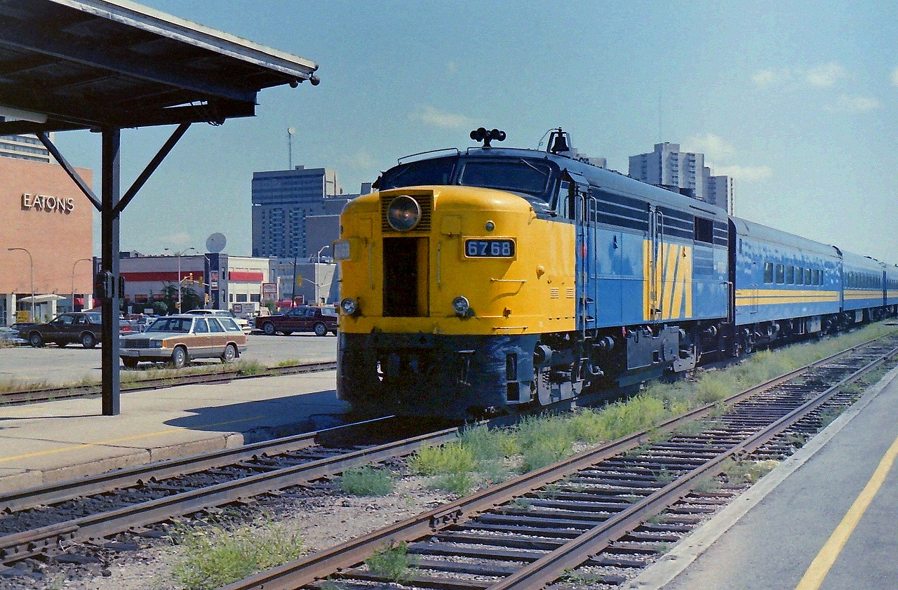 This is the area of London Ont that I grew up in during the 1950's. Though much has changed the platforms & their canopies have remained. I had a signed release from the CN staff in the black tower, & after showing it to the CN police I walked over to the platform area & took a few photographs. It's always nice to get up close to rail activity in an area that is safe. Even the weather cooperated. It was a great & interesting day with many VIA trains coming & going.

One of my rules was to get permission to be on the property, never stand in the tracks or on the rails, never climb on the equipment, & only take pictures. Also be aware of all activity around you.