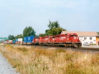  Once the closing of the CP Ottawa Valley line (Chalk River) was announced, that meant stack trains running east of Sudbury were going to be nothing but a memory. This memory captured at the village of Warren, just east of Sudbury with CP 5995, 5975 and 5736 is a prime example. Traffic now runs south to Toronto thru Parry Sound and east from there.