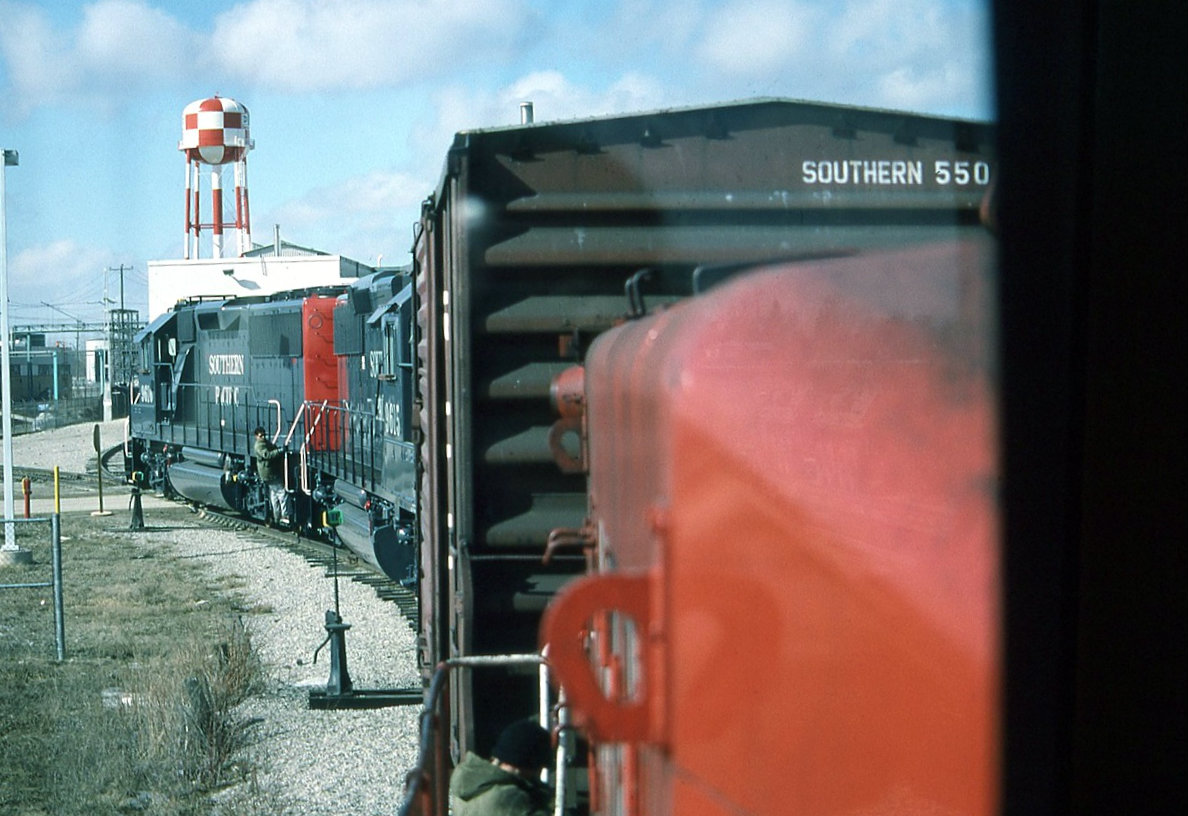 With one box car returning from the switching moves at Somerville industries CP 8133 has picked up the two new SP GP60,s at GMD and is ready to head back to Quebec street.
