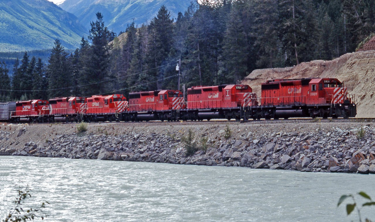From the good old days when CP loaded on the power.  This train is departing Golden, BC heading east with five SD40-2's and a solitary GP9 in the middle of the consist.  The numbers are CP 5931, CP 5766, CP 5607, CP 1527 (the GP9), CP 5865 and CP 6000.