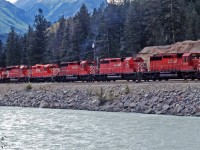 From the good old days when CP loaded on the power.  This train is departing Golden, BC heading east with five SD40-2's and a solitary GP9 in the middle of the consist.  The numbers are CP 5931, CP 5766, CP 5607, CP 1527 (the GP9), CP 5865 and CP 6000.