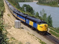 The eastbound "Canadian" hustles out of the Brickburn siding, only moments away from the Calgary Station.