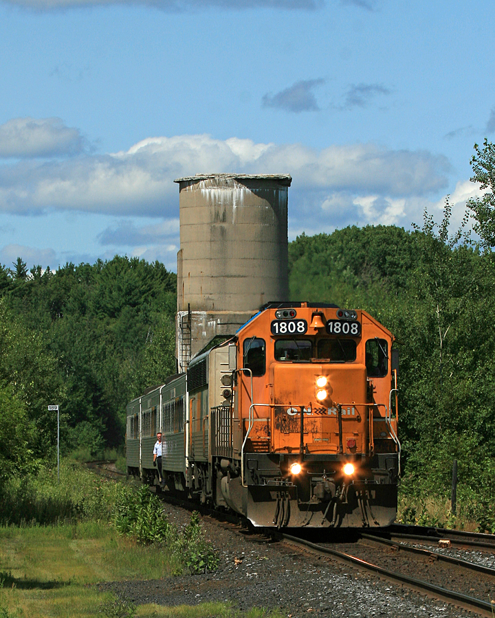 The southbound Northlander slows for the station stop in South River on a warm summer day back in 2009, with the ruins of the old coaling tower in the background.