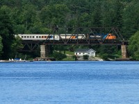 After shooting the southbound Northlander in South River we raced down to Huntsville to catch it crossing the Muskoka River from across Hunter's Bay. I figured I'd have a chance to toss a few casts in the bay while waiting for the train to get there, but as I got the fishing rod out of the trunk I heard the whistle blowing at the north end of town and grabbed the camera instead. I won't say exactly how fast I drove down Highway 11, I'll just say the train made pretty darn good time!
