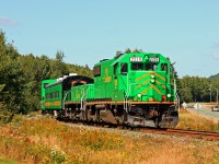 On 9/9/2009 government and railroad dignitaries got together for a photo op to commemorate a $36M investment for track and equipment (and by extension rail service) improvements in the NBSR service area. The railroad put together this sweet consist to move the VIPs back up the line a ways to observe some trackwork in progress. A big thank-you to engineer Gilles and conductor Chris for giving me the heads-up about this event while chatting with them the day before at McAdam Station, as they waited for clearance to proceed with train 908.