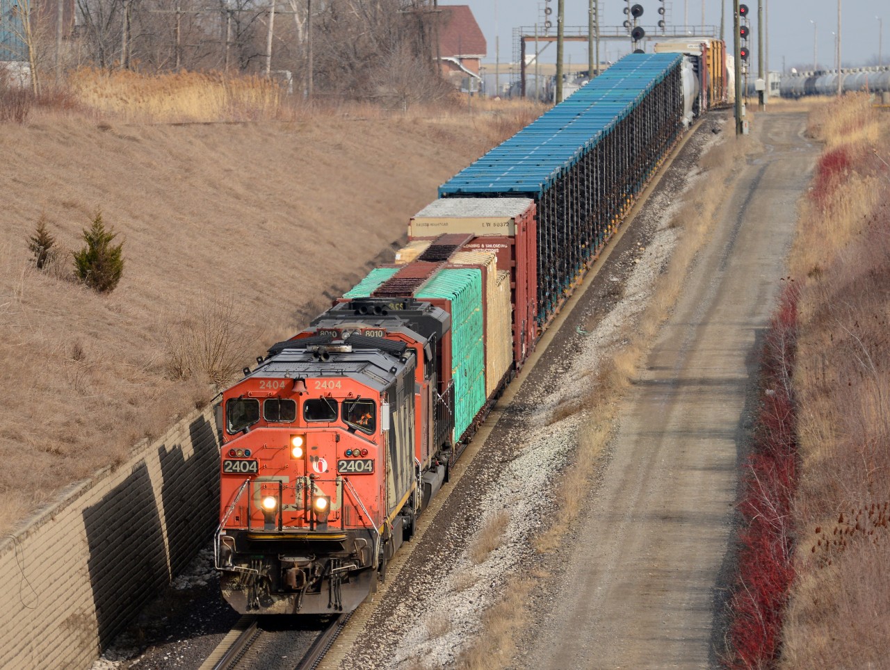 CN 2404 with CN 8010 lead the daily 501 train through the St. Clair River Tunnel to Port Huron, Mi.