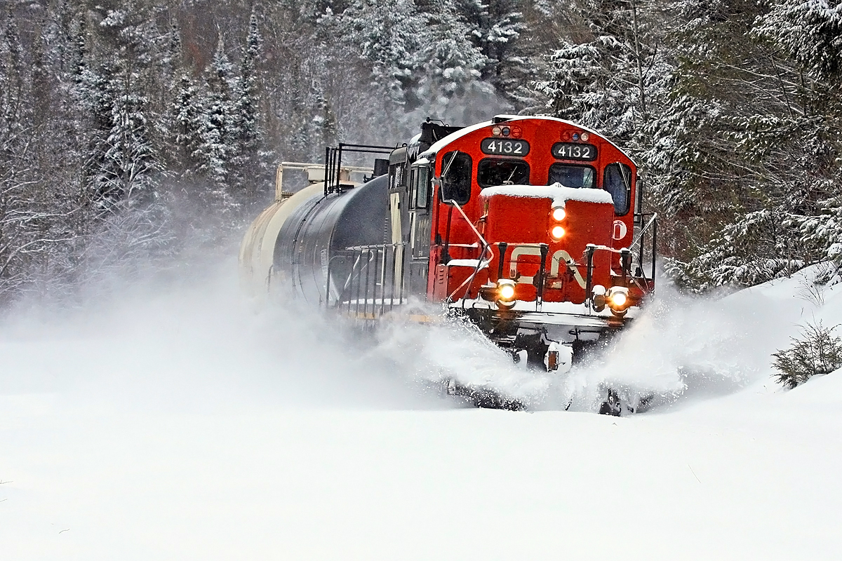 CN 595 continues around the bend at Utterson after a fresh snowfall on one of its twice-weekly trips down to Longford Mills.