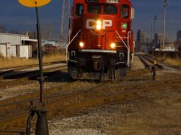 CP GP20-ECO #2325 is "Rock'n and Roll'n" as it pulls out of the Essex Terminal Interchange yard in Windsor, Ontario after delivering 10 cars to the ETR first thing in the morning.