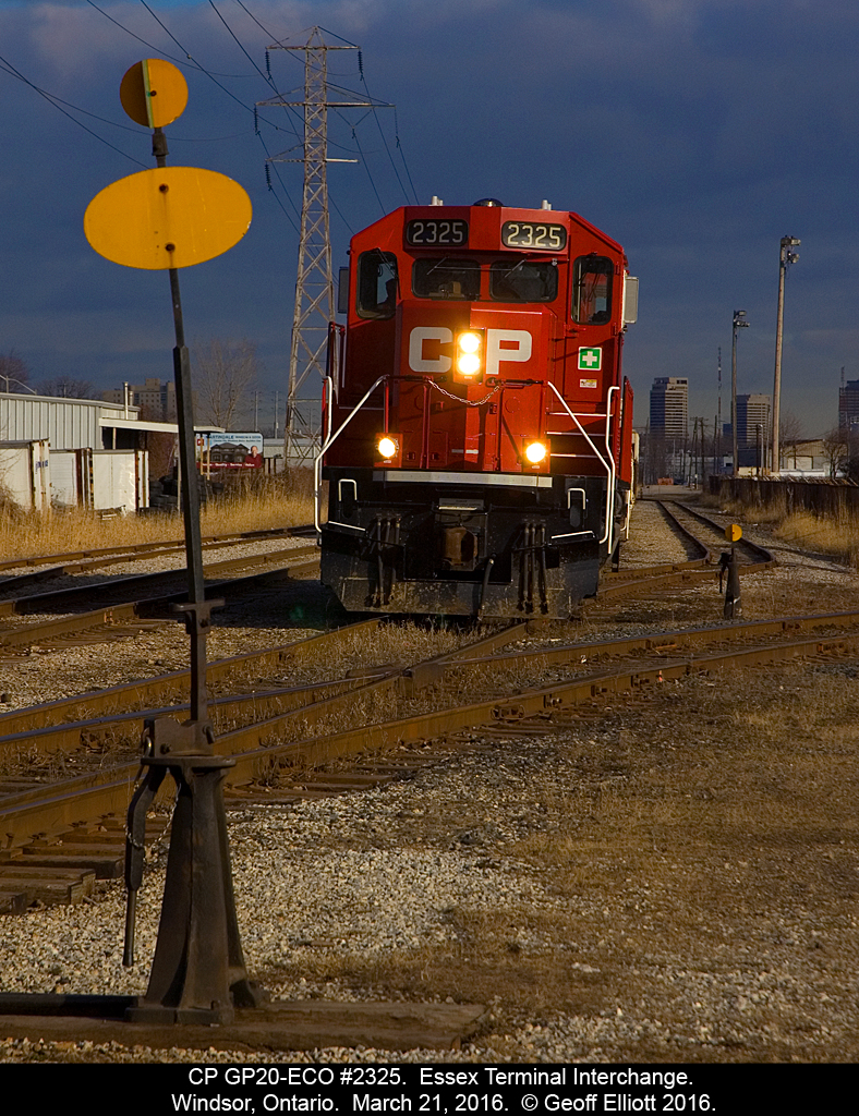 CP GP20-ECO #2325 is "Rock'n and Roll'n" as it pulls out of the Essex Terminal Interchange yard in Windsor, Ontario after delivering 10 cars to the ETR first thing in the morning.
