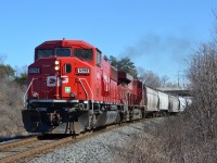 One of three CP painted SD60Ms lead CP 255 North out of Desjardins