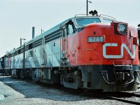 <br>
<br>
 At the time,  THE place to Railfan 
<br>
<br>
The smell and sounds of  Alco - MLW power. 
<br>
<br>
Four decades ago. 
<br>
<br>
1958 built MLW  FPA-4  #6761 is MU'd with one of two FPA-2u (the original 244 engine (1600 HP) replaced with the 1800 HP Alco 251B engine) on the CN roster CN#6758 
<br>
<br>
Also present is FPA-4 6774 and FP9A 6539, and that ladder is leaning on the B end of another FP9A.
<br>
<br>
 June 1977 at the CNR Spadina service facility and roundhouse. Kodak negative film transported in a Nikkormat EL, by S.Danko.
<br>
<br>
p.s. Even in 1977 this lashup was unique enough to ignore normal photography protocol and shoot the  shady  – back lit - side of these units....please note: achievable only because of the phenomenal exposure latitude capabilities of colour negative film !
<br>
<br>
 more Spadina:
<br>
<br>
<a href="http://www.railpictures.ca/?attachment_id=1650"> MLW 6758 </a> 
<br>
<br>
<a href="http://www.railpictures.ca/?attachment_id=7277"> a contrast of yellow and cab design</a> 
<br>
<br>
<a href="http://www.railpictures.ca/?attachment_id=1965"> cab design </a> 
<br>
<br>
 sdfourty