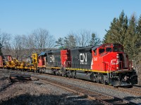 A pair of SD40 variants lead a ribbon rail train up the Bala, this work train was ordered at 0700 Mac Yard and began dumping rail in Richmond Hill. The train will head into the siding at Pine Orchard to allow VIA No.2, CN 108, CN 105 and CN 317 by before shoving out and continuing dumping rail at Mile 31. 