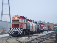 Greater Winnipeg Water District #200 (MLW RS23) does some work in their yard after returning from the Deacon Water Treatment Plant, just east of Winnipeg.